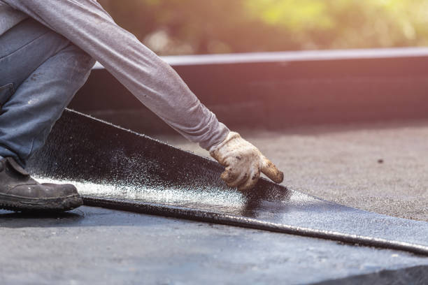 Professional Waterproofing technician working in Clayton, AL